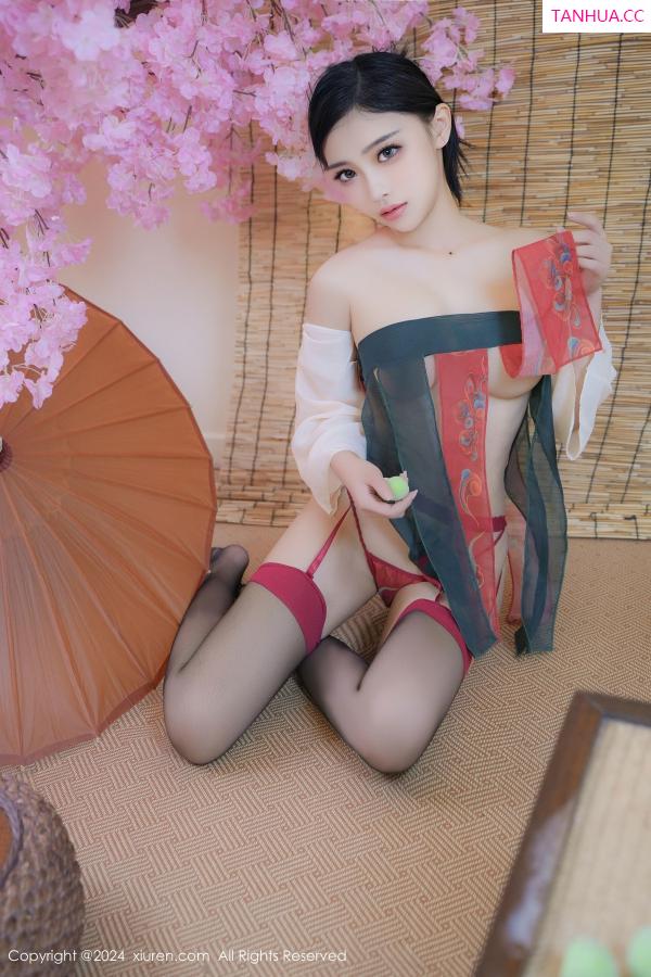   [XiuRen]高清写真图 2024.10.28 No.9351 妙可可Cheese 黑丝美腿第39张图片
